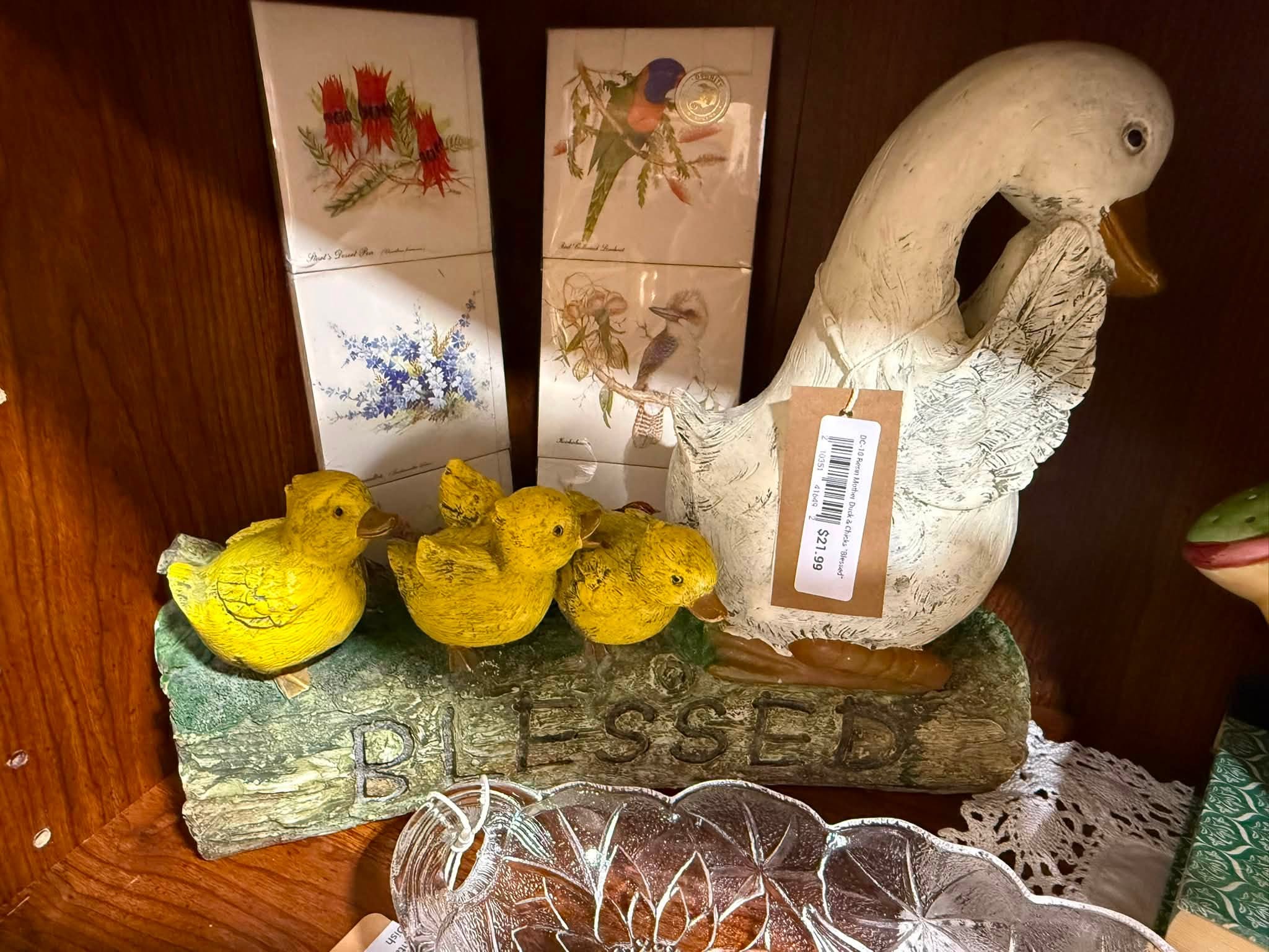 Vintage duck and chicks figurines with collectible bird tile art